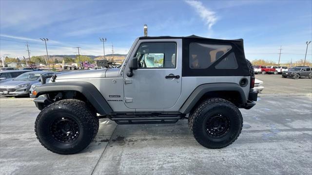 used 2014 Jeep Wrangler car, priced at $17,906