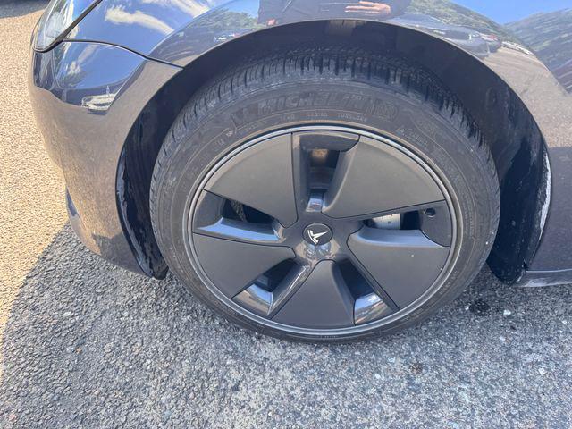 used 2023 Tesla Model 3 car, priced at $27,800