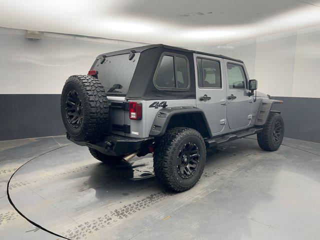 used 2013 Jeep Wrangler Unlimited car, priced at $17,700