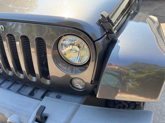 used 2016 Jeep Wrangler Unlimited car, priced at $26,568