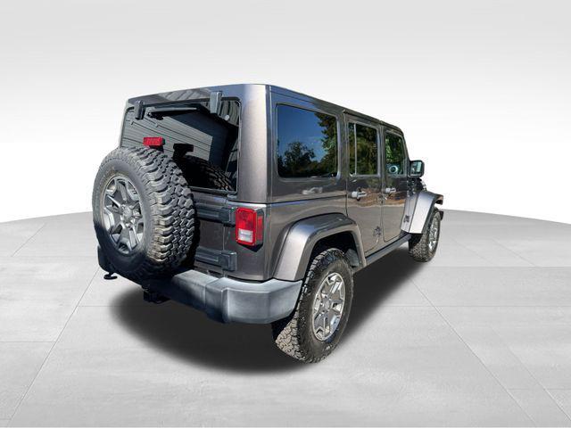 used 2016 Jeep Wrangler Unlimited car, priced at $26,568