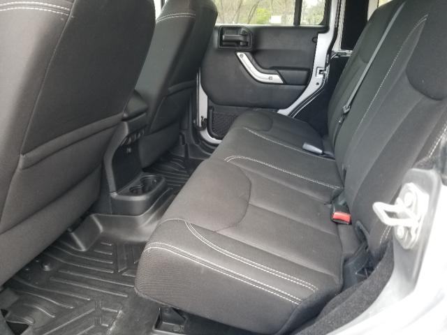 used 2016 Jeep Wrangler Unlimited car, priced at $19,390