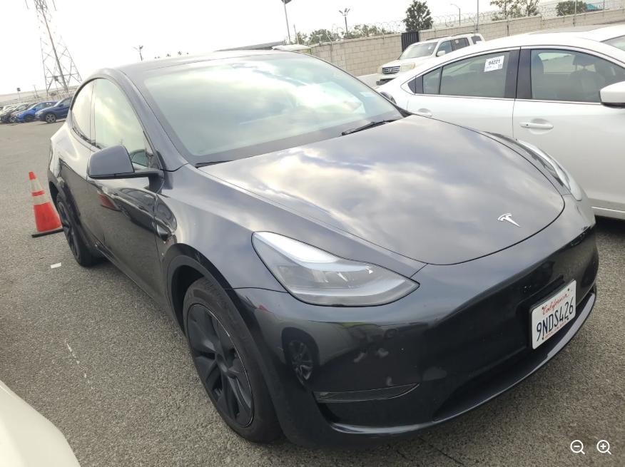 used 2024 Tesla Model Y car, priced at $34,980