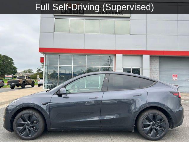 used 2025 Tesla Model Y car, priced at $34,780