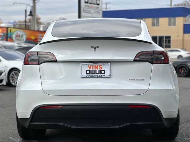 used 2023 Tesla Model Y car, priced at $35,980