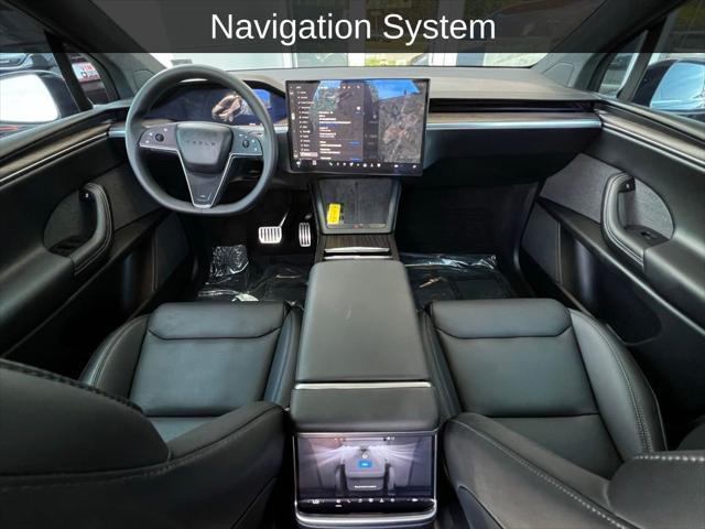 used 2023 Tesla Model X car, priced at $54,980
