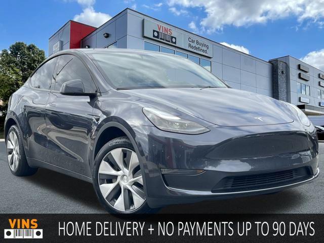 used 2024 Tesla Model Y car, priced at $33,994