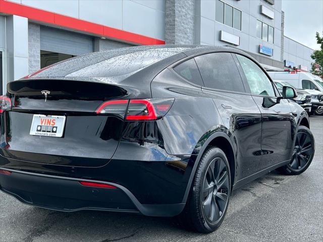 used 2024 Tesla Model Y car, priced at $31,980