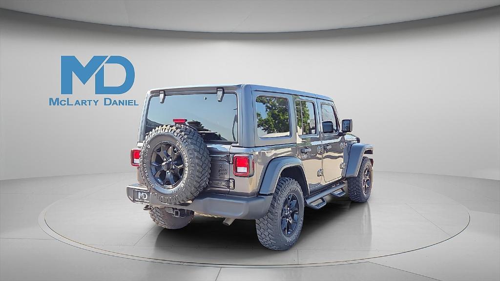 used 2021 Jeep Wrangler Unlimited car, priced at $31,995