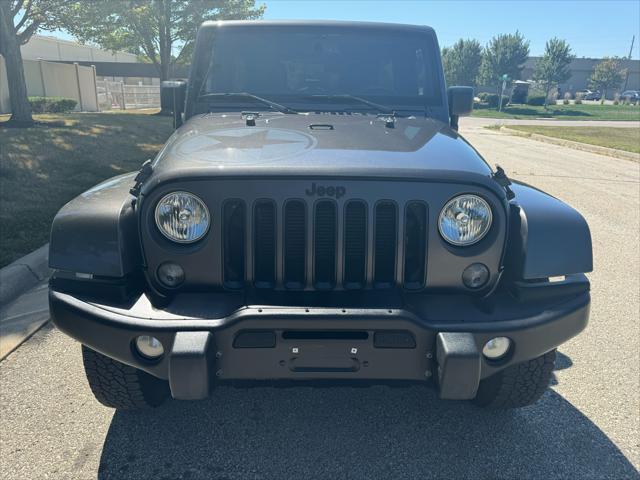 used 2018 Jeep Wrangler JK Unlimited car, priced at $23,950