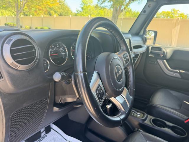 used 2018 Jeep Wrangler JK Unlimited car, priced at $23,950