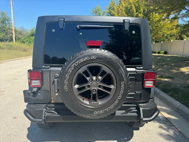 used 2018 Jeep Wrangler JK Unlimited car, priced at $23,950