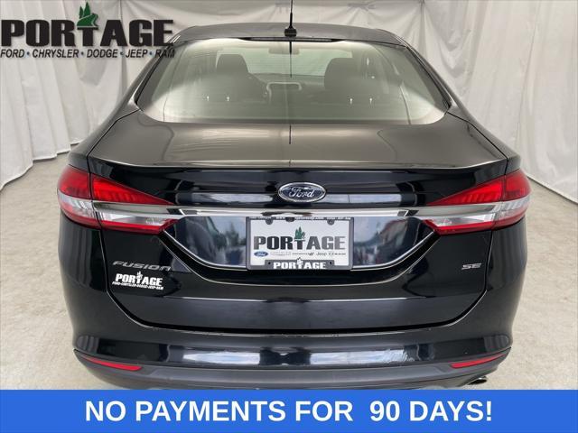 used 2018 Ford Fusion car, priced at $12,998