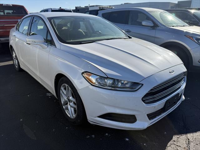 used 2015 Ford Fusion car, priced at $9,999