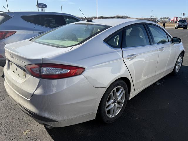 used 2015 Ford Fusion car, priced at $9,999