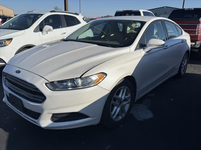 used 2015 Ford Fusion car, priced at $9,999