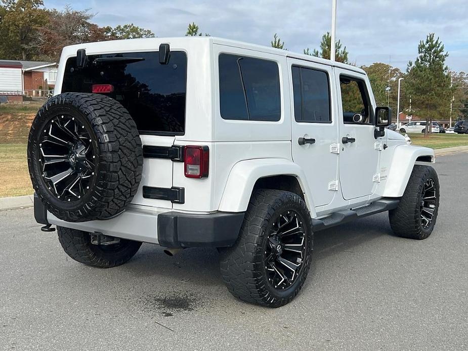 used 2014 Jeep Wrangler Unlimited car, priced at $18,486