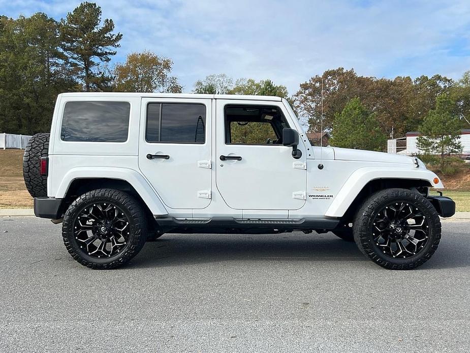 used 2014 Jeep Wrangler Unlimited car, priced at $18,486