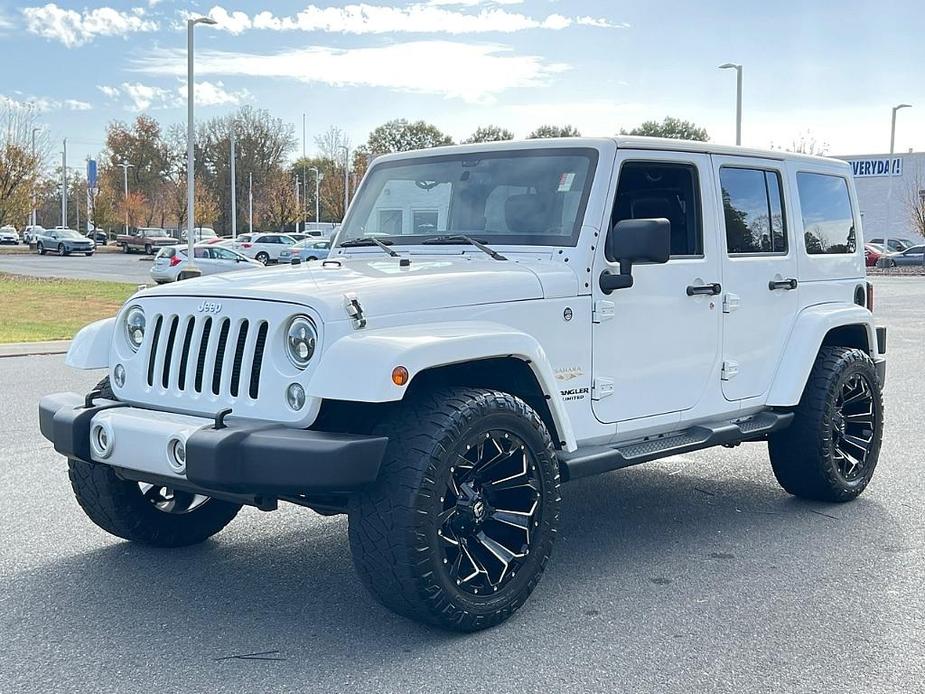 used 2014 Jeep Wrangler Unlimited car, priced at $18,486