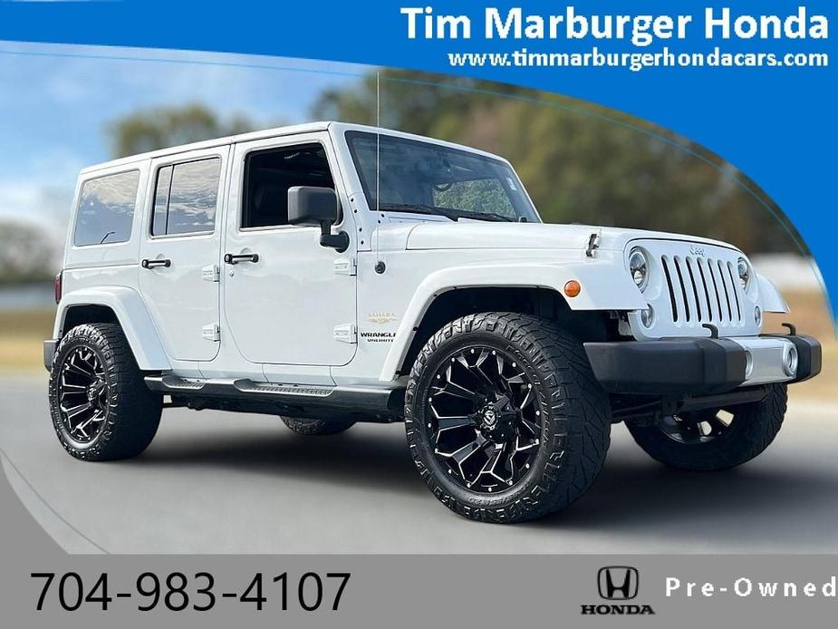 used 2014 Jeep Wrangler Unlimited car, priced at $18,486