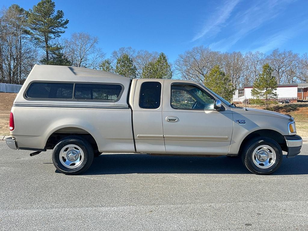 used 1999 Ford F-150 car, priced at $8,487