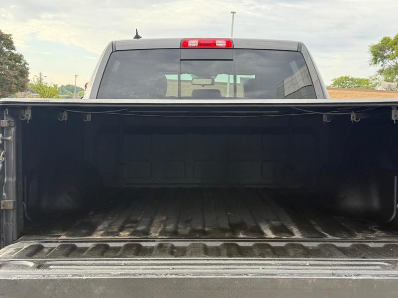 used 2018 Ram 1500 car, priced at $27,152