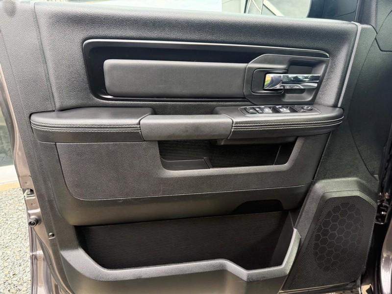 used 2018 Ram 1500 car, priced at $27,152