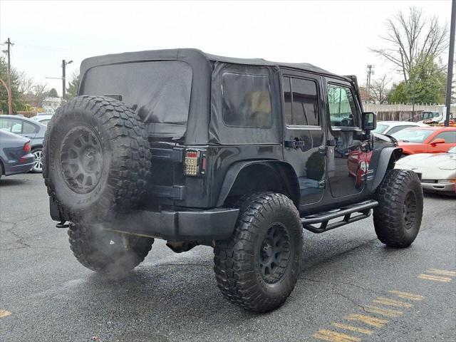 used 2014 Jeep Wrangler Unlimited car, priced at $15,995