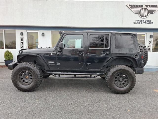 used 2014 Jeep Wrangler Unlimited car, priced at $15,995