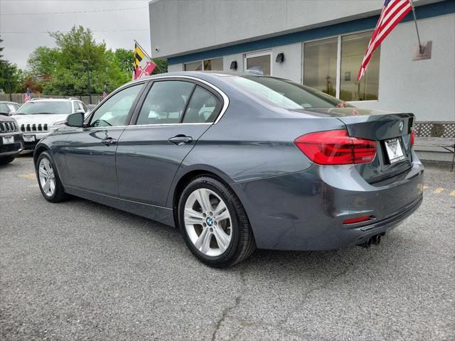 used 2018 BMW 330 car, priced at $15,299