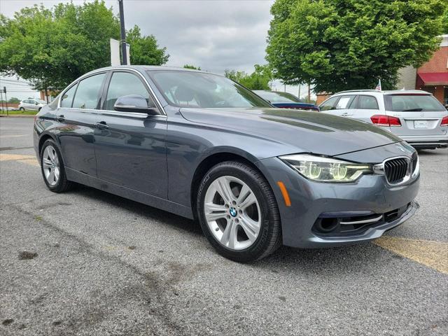 used 2018 BMW 330 car, priced at $15,299