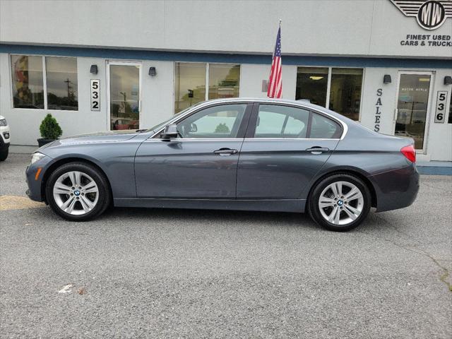 used 2018 BMW 330 car, priced at $15,299