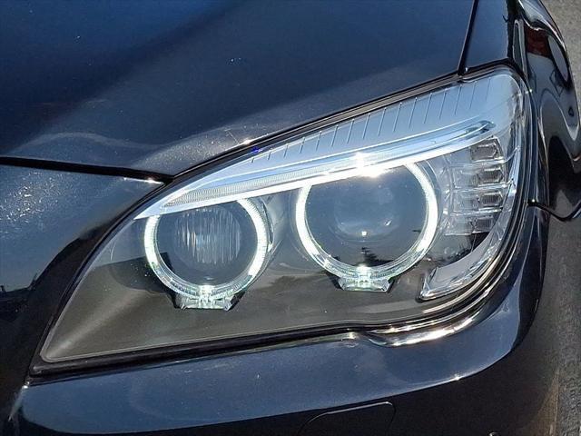 used 2013 BMW 750 car, priced at $13,599