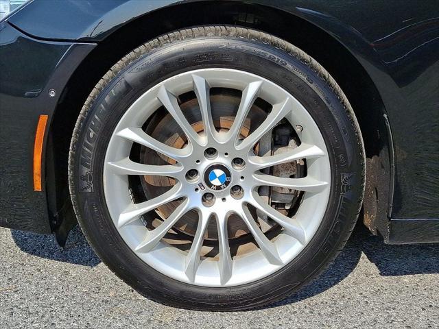 used 2013 BMW 750 car, priced at $13,599