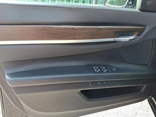 used 2013 BMW 750 car, priced at $13,599