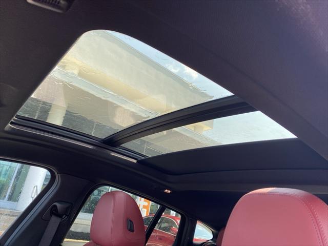 used 2022 BMW X4 car, priced at $43,998