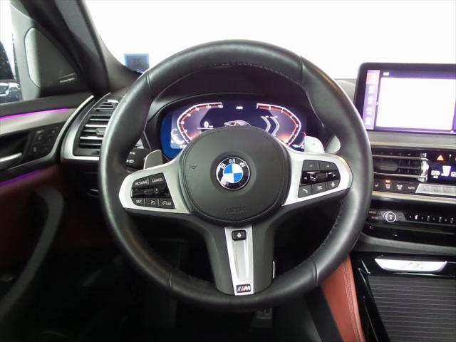 used 2024 BMW X4 car, priced at $60,923