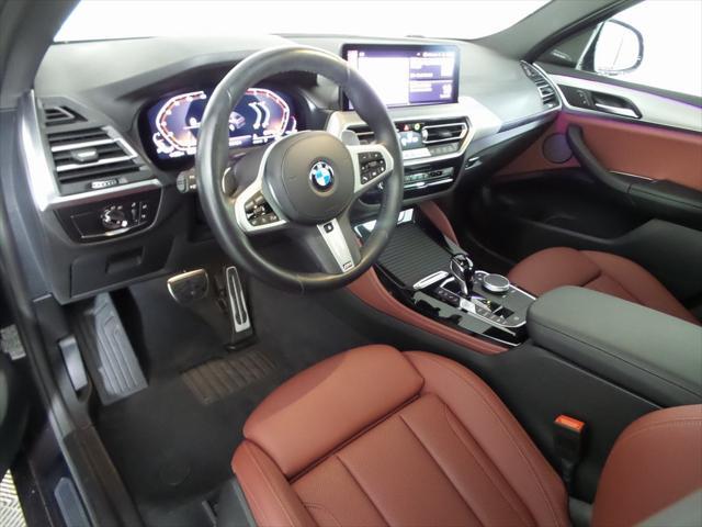 used 2024 BMW X4 car, priced at $60,923