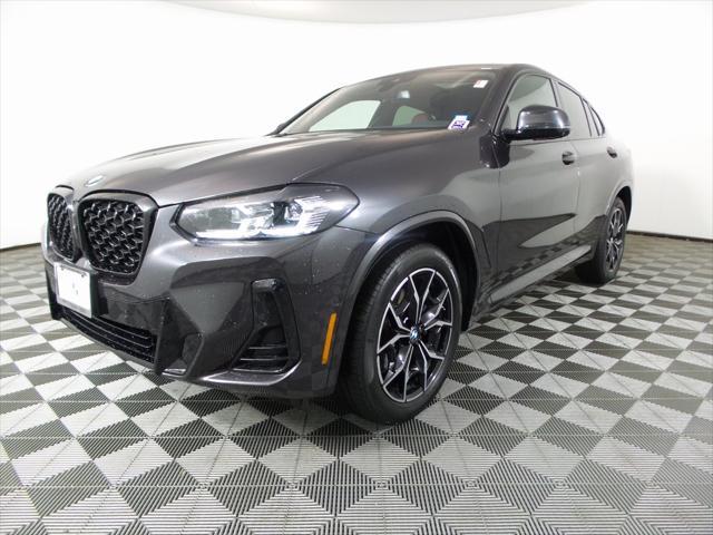 used 2024 BMW X4 car, priced at $60,923