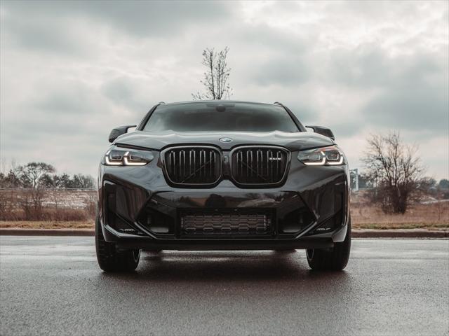 new 2024 BMW X4 M car, priced at $91,880