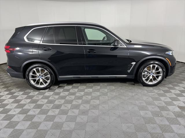 used 2025 BMW X5 PHEV car, priced at $75,890