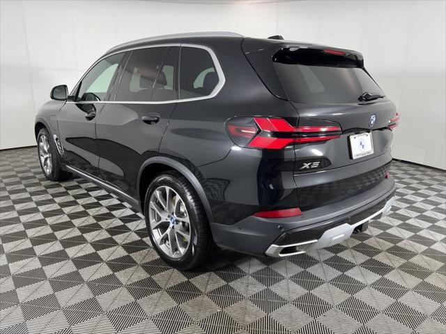 used 2025 BMW X5 PHEV car, priced at $75,890