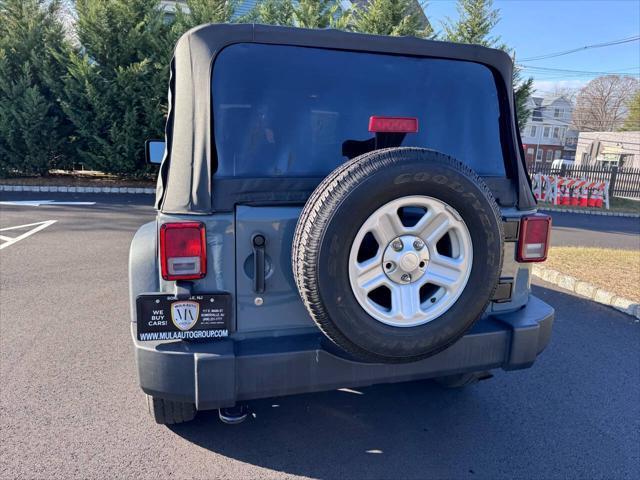 used 2014 Jeep Wrangler car, priced at $12,995