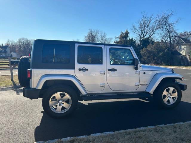 used 2009 Jeep Wrangler Unlimited car, priced at $13,995