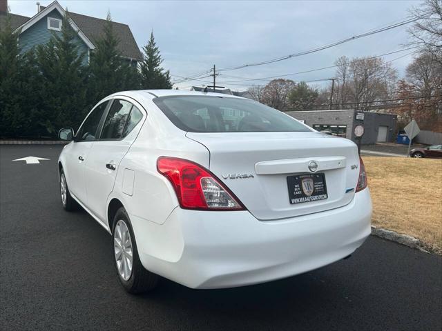 used 2012 Nissan Versa car, priced at $5,995