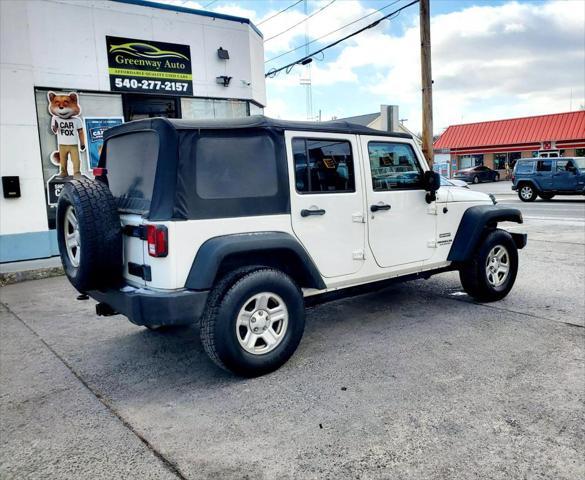 used 2010 Jeep Wrangler Unlimited car, priced at $11,990