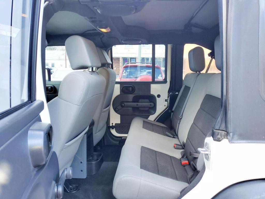 used 2010 Jeep Wrangler Unlimited car, priced at $10,990