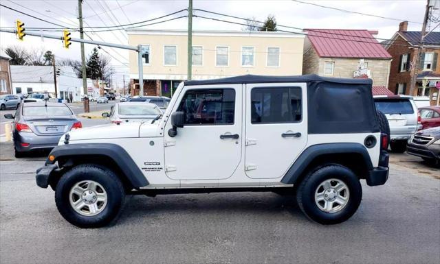 used 2010 Jeep Wrangler Unlimited car, priced at $11,990