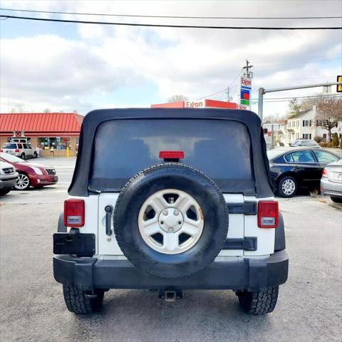 used 2010 Jeep Wrangler Unlimited car, priced at $11,990