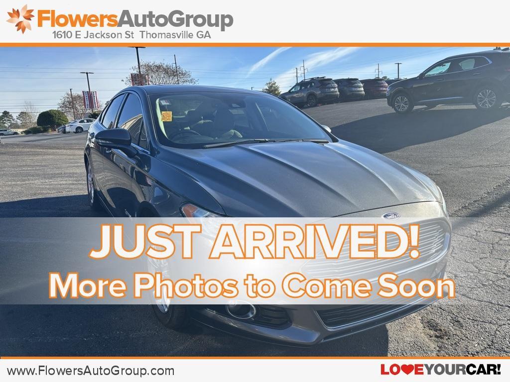 used 2015 Ford Fusion Hybrid car, priced at $10,000